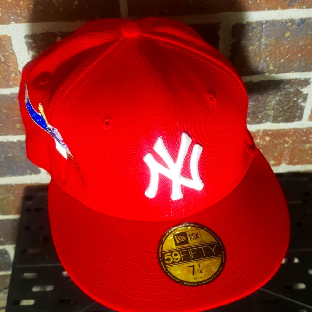 NY Yankees 2000 hat.